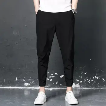 Erkek harem pantolon 2021 Yaz Siyah Casual Sweatpants Erkekler Joggers Nefes Erkek Tayt Gevşek Moda Ayak Bileği Uzunluğu Pantolon